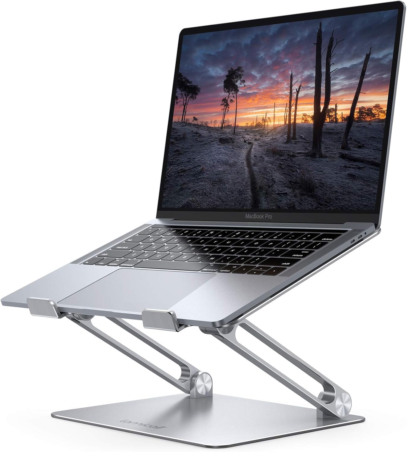 Showcases the laptop stand's sleek design and ergonomic features to improve user comfort and productivity. Demonstrates how the stand elevates the laptop for better viewing angle and posture in a…