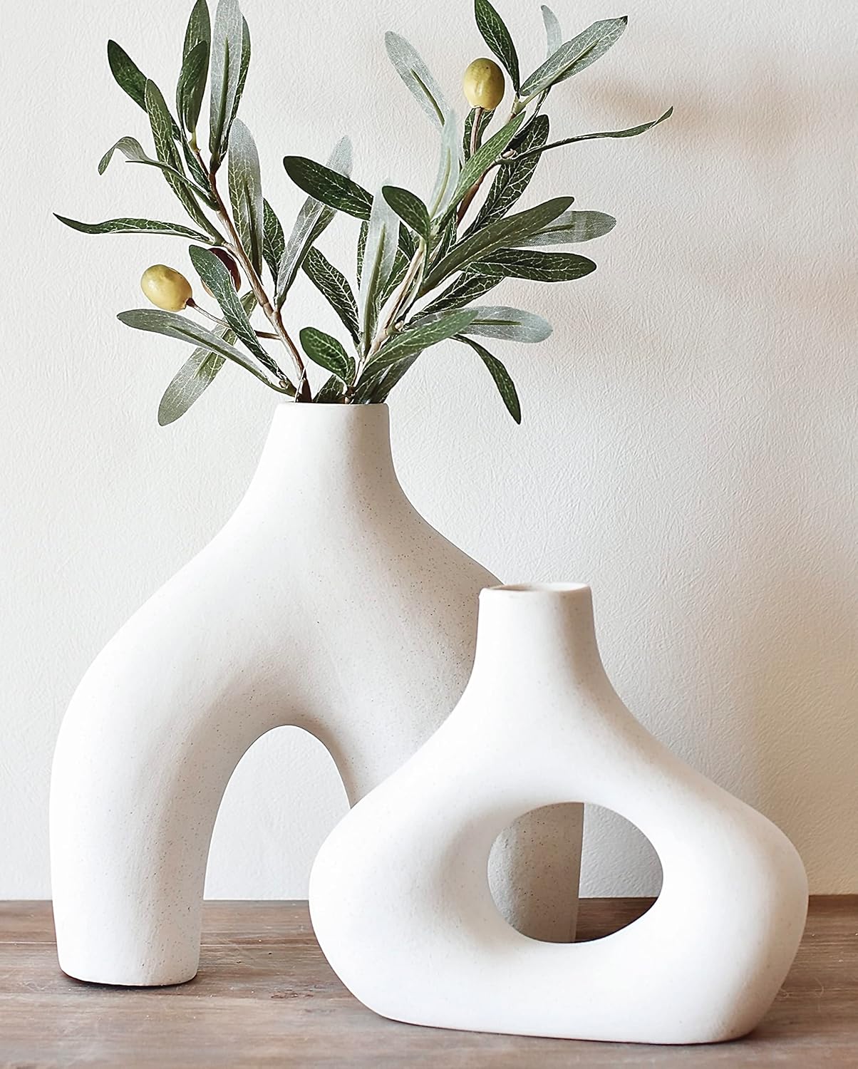Showcases the product in a stylish, minimalist home setting to appeal to design-conscious consumers.