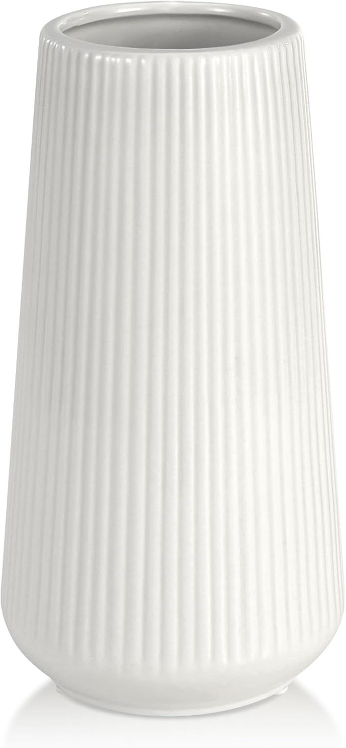 Showcases the clean, modern design of the vase with its ribbed texture against a white background.