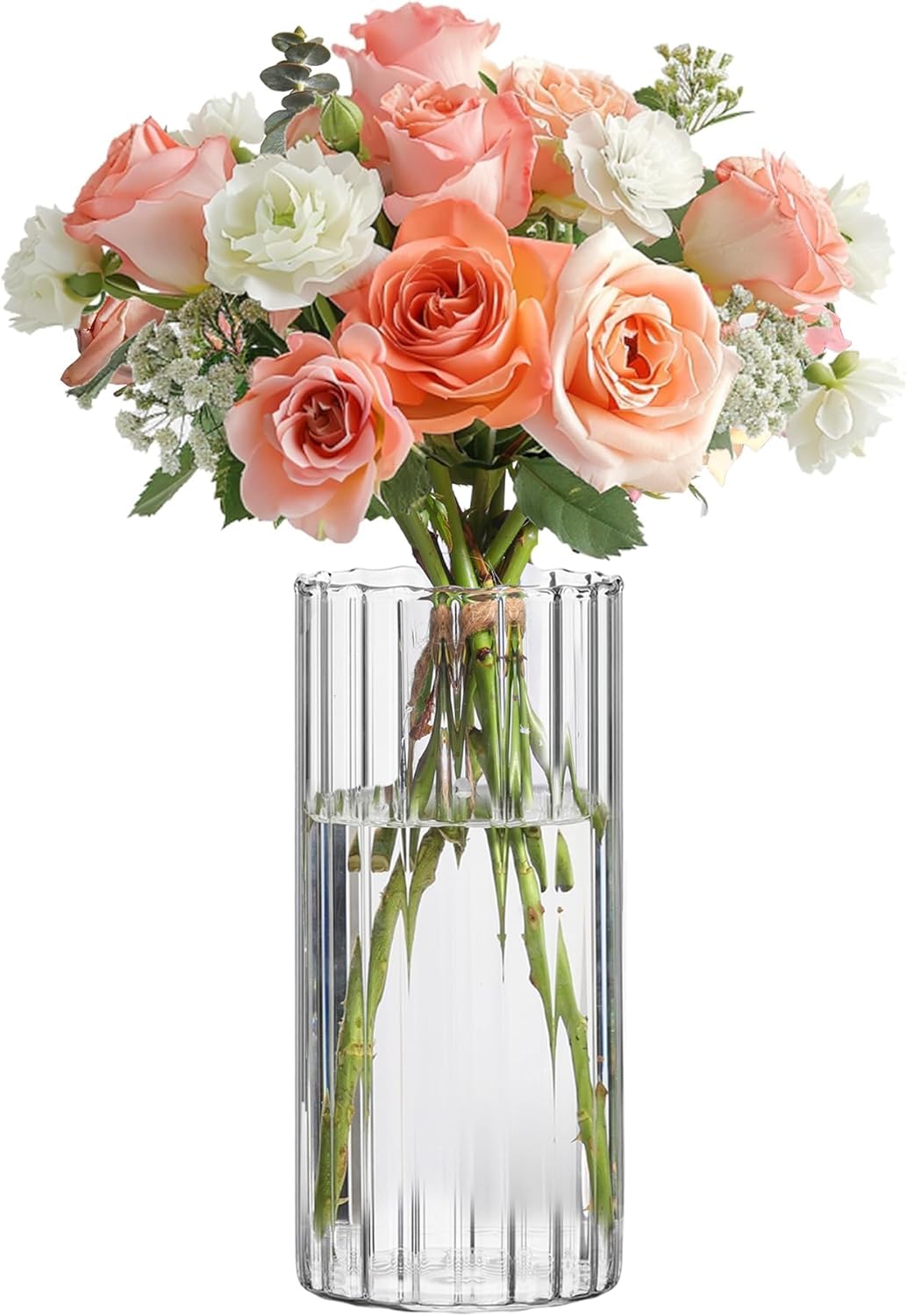Showcases the beauty and composition of the flower bouquet in a clear glass vase.