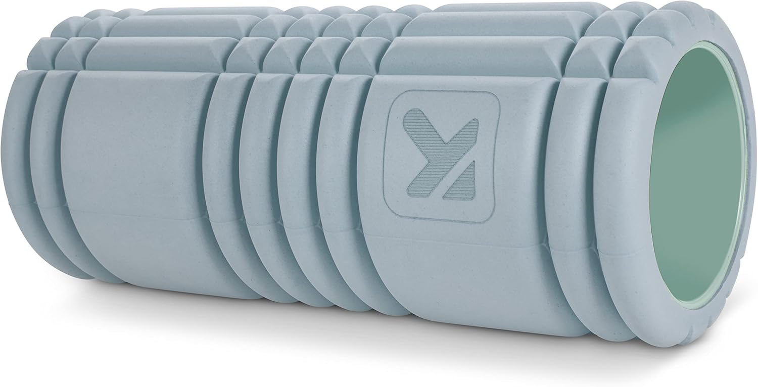 Showcases the product's design and texture to highlight its functionality as a foam roller for muscle recovery and fitness.