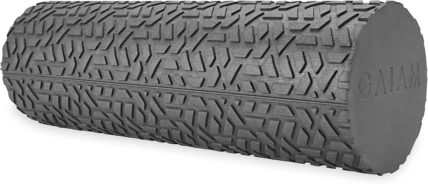 Showcases the unique tread pattern and texture of the foam roller to highlight its grip and effectiveness for muscle massage.