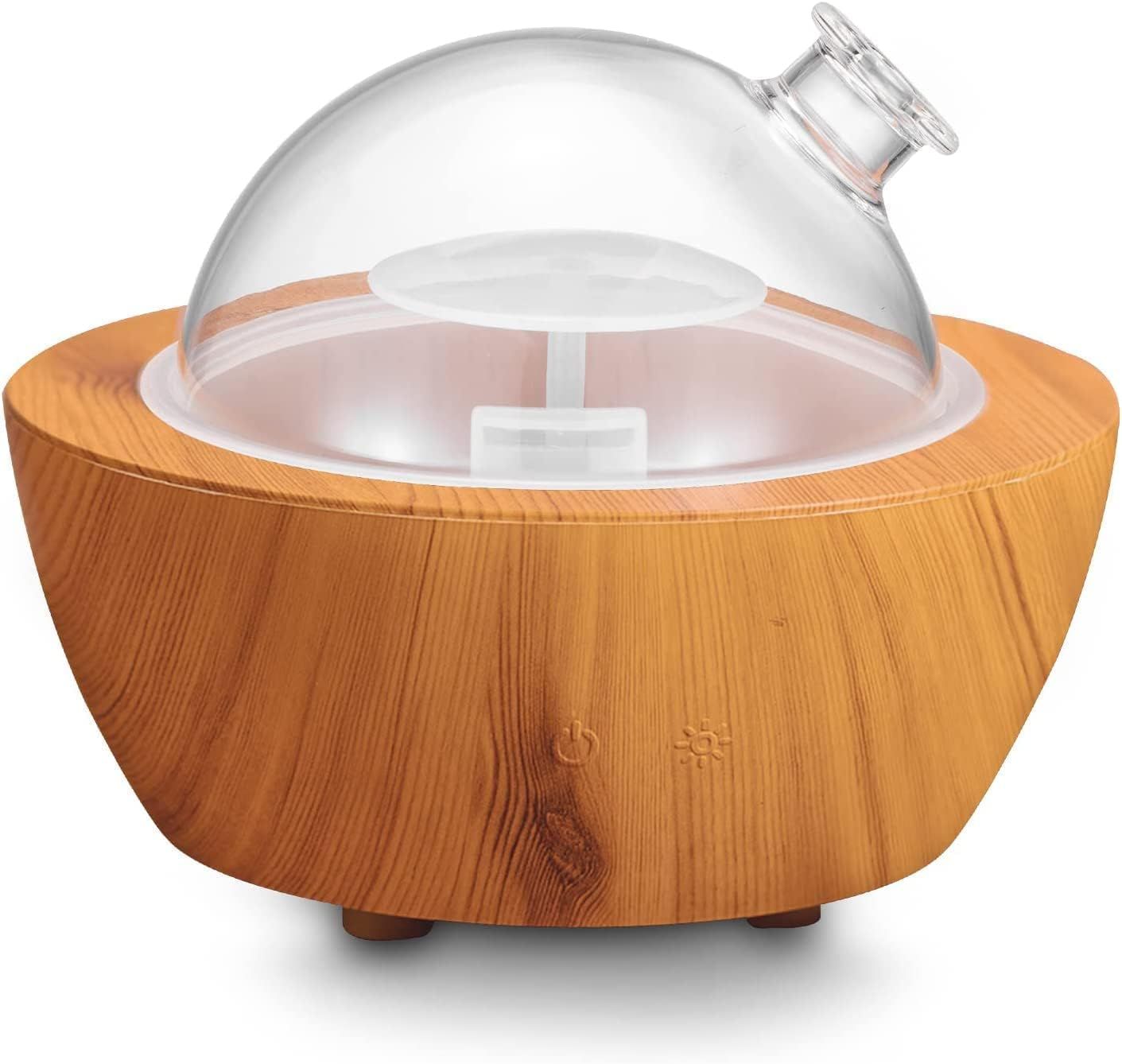 Displays the complete product clearly on a white background to show the wood grain aesthetic and transparent dome feature, helping shoppers identify the aromatherapy diffuser or humidifier being sold.