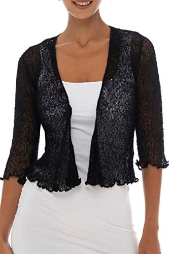 Shows how the black lace cardigan fits and looks when worn, helping shoppers visualize the product on themselves and understand its styling potential.