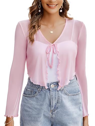 Shows how the pink top fits and looks when worn, helping shoppers visualize the garment on themselves and understand its style and drape.