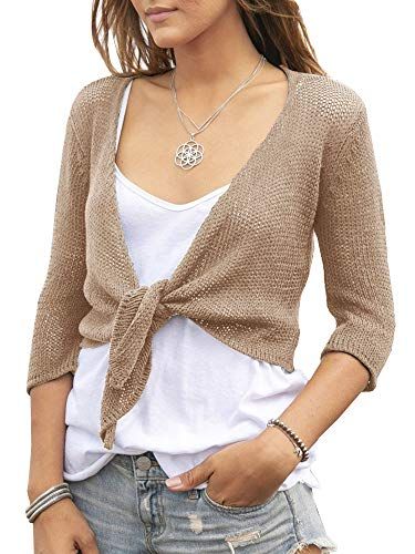 Shows how the cardigan fits and looks when worn, helping shoppers visualize the product on themselves and understand the styling options.