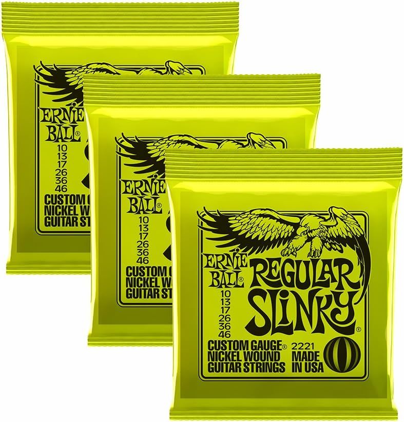 Shows the product packaging clearly to help shoppers identify the Ernie Ball Regular Slinky guitar strings and communicate that multiple packs are included in the purchase.