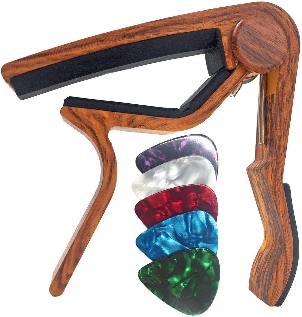 Shows the guitar capo along with all included colorful guitar picks to communicate the full value of the purchase and what the buyer will receive.