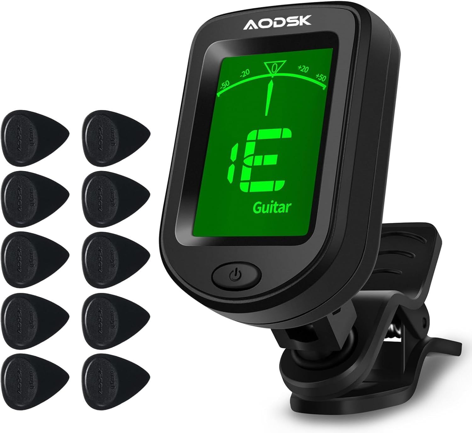 Shows the guitar tuner along with all included guitar picks to communicate the complete package contents and value to the buyer.