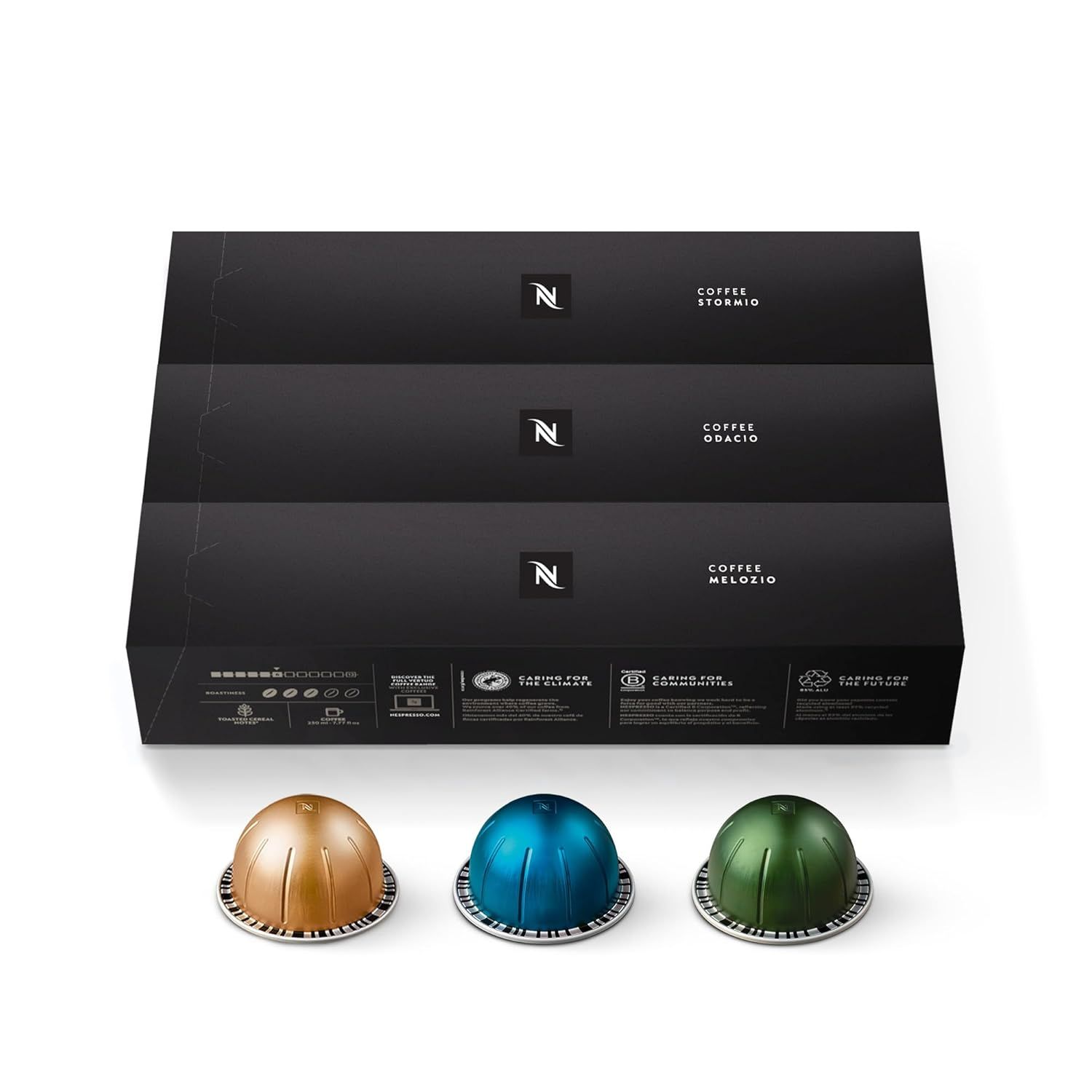 Showcases the product in its elegant retail packaging alongside the coffee capsules to communicate brand quality and professionalism. Displays three different coffee capsule varieties to show…