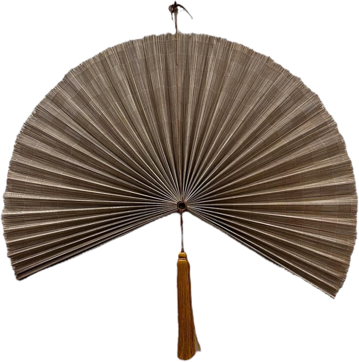 Displays the core product clearly on a white background to show the fan's full spread, material texture, and decorative tassel detail. Demonstrates the fan in its fully opened state to show how it…