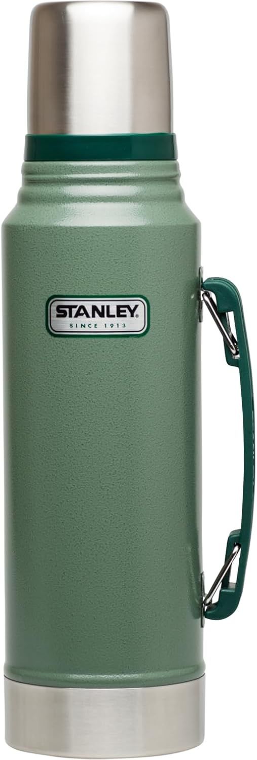Displays the Stanley vacuum bottle as the core product in a clean catalog style, showcasing its classic design, brand heritage, and functional features like the handle and stainless steel cap.