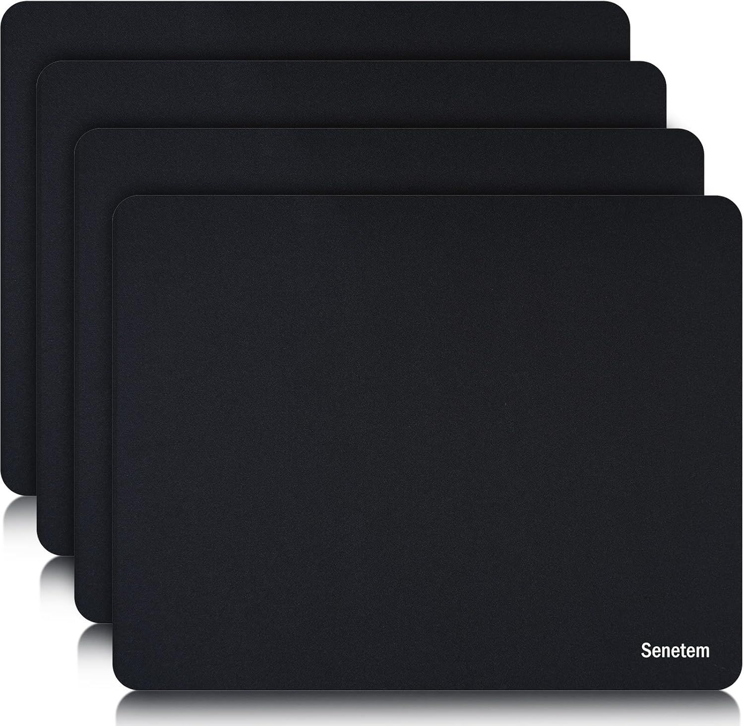Shows the core product as a set of four identical black mouse pads, clearly displaying the quantity included in the purchase. Uses drop shadows and reflections beneath the stacked mouse pads to…