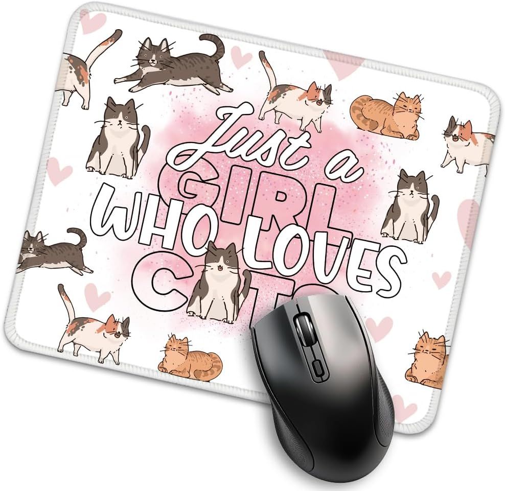 Shows the core product—a mouse pad with a cat-themed design—clearly displayed with a computer mouse to demonstrate its intended use and scale. Highlights the decorative design elements printed on…