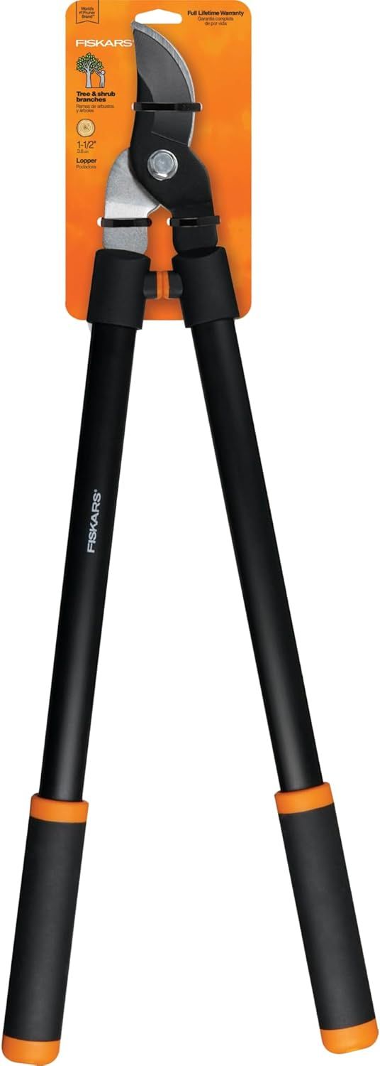 Displays the Fiskars lopper tool clearly to show shoppers the product design, blade mechanism, and handle construction for cutting tree and shrub branches. Shows the product in its retail packaging…