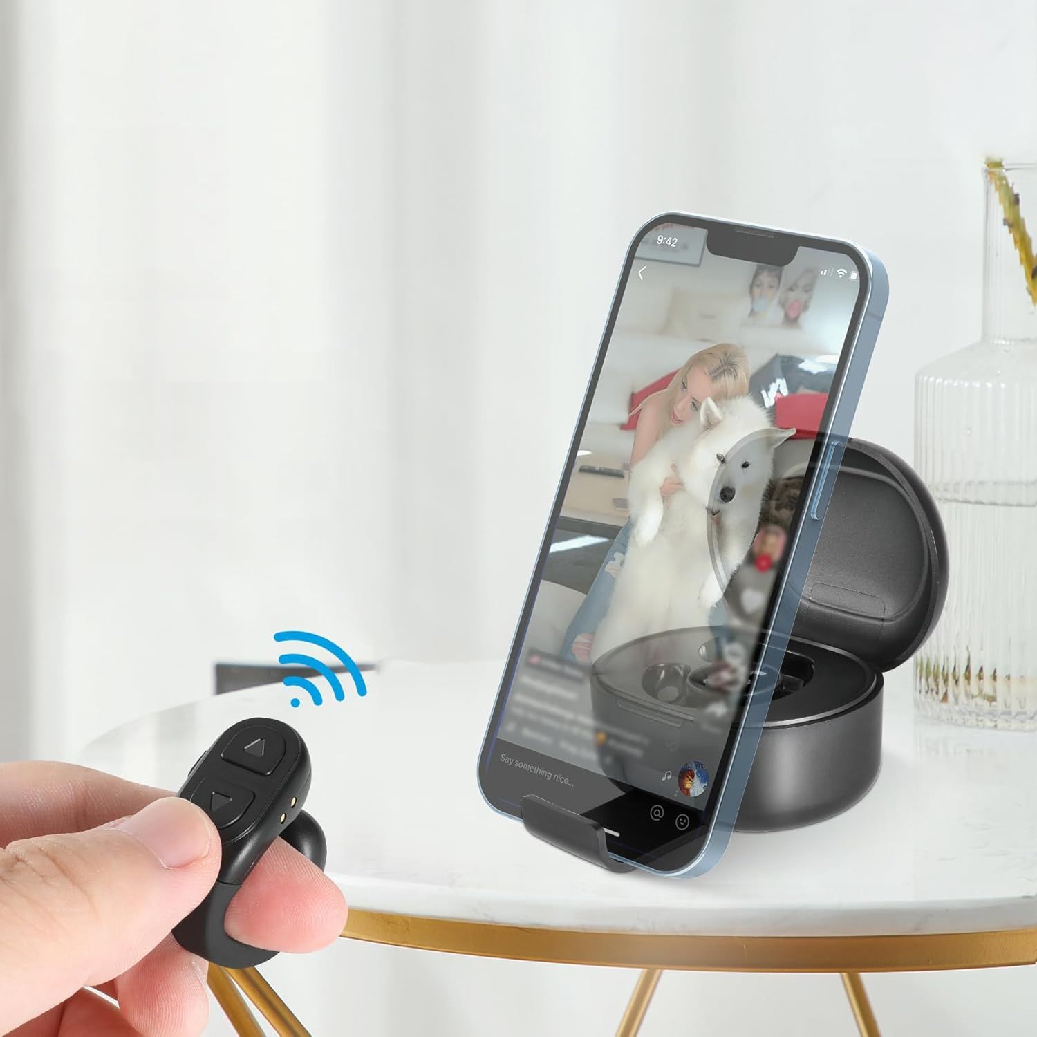 Demonstrates how the product works by showing the remote control wirelessly controlling the pet camera to display a live video feed on a smartphone, reassuring shoppers they can monitor their pets…