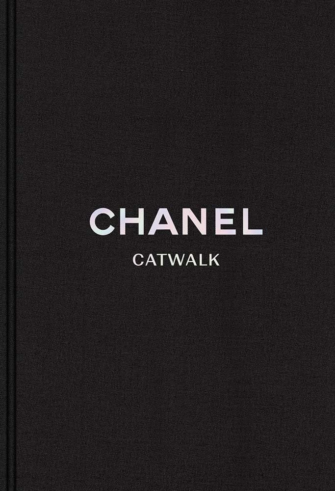 Displays the core product, a Chanel Catwalk book, with clean minimalist presentation to communicate luxury and brand prestige.