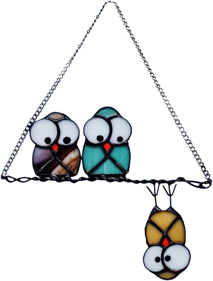 Displays the core sellable product, a decorative stained glass hanging ornament featuring three whimsical owls on a branch with a chain for hanging.
