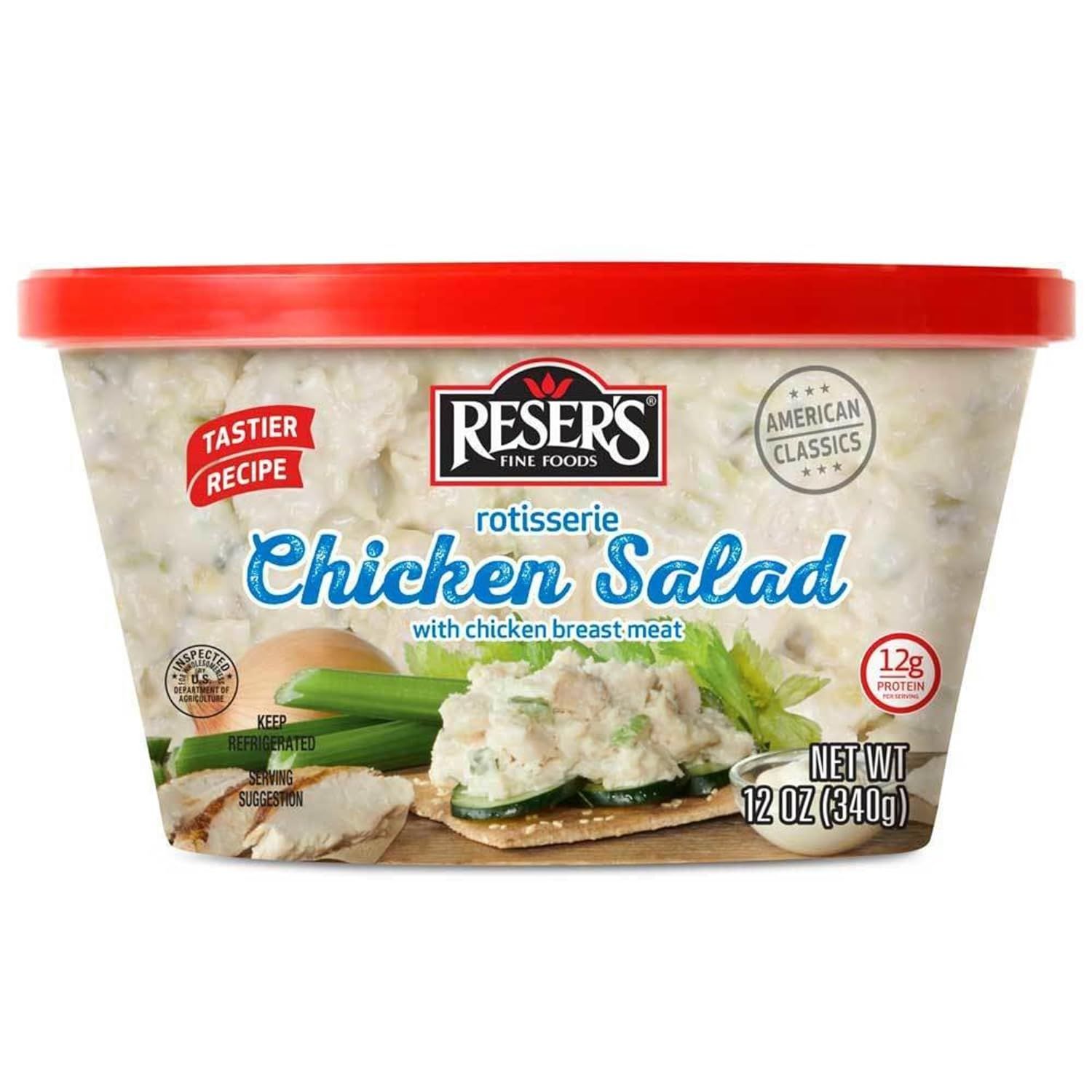 Displays the core sellable product clearly showing the Reser's rotisserie chicken salad container with visible product through the packaging and serving suggestion to communicate what the shopper is…