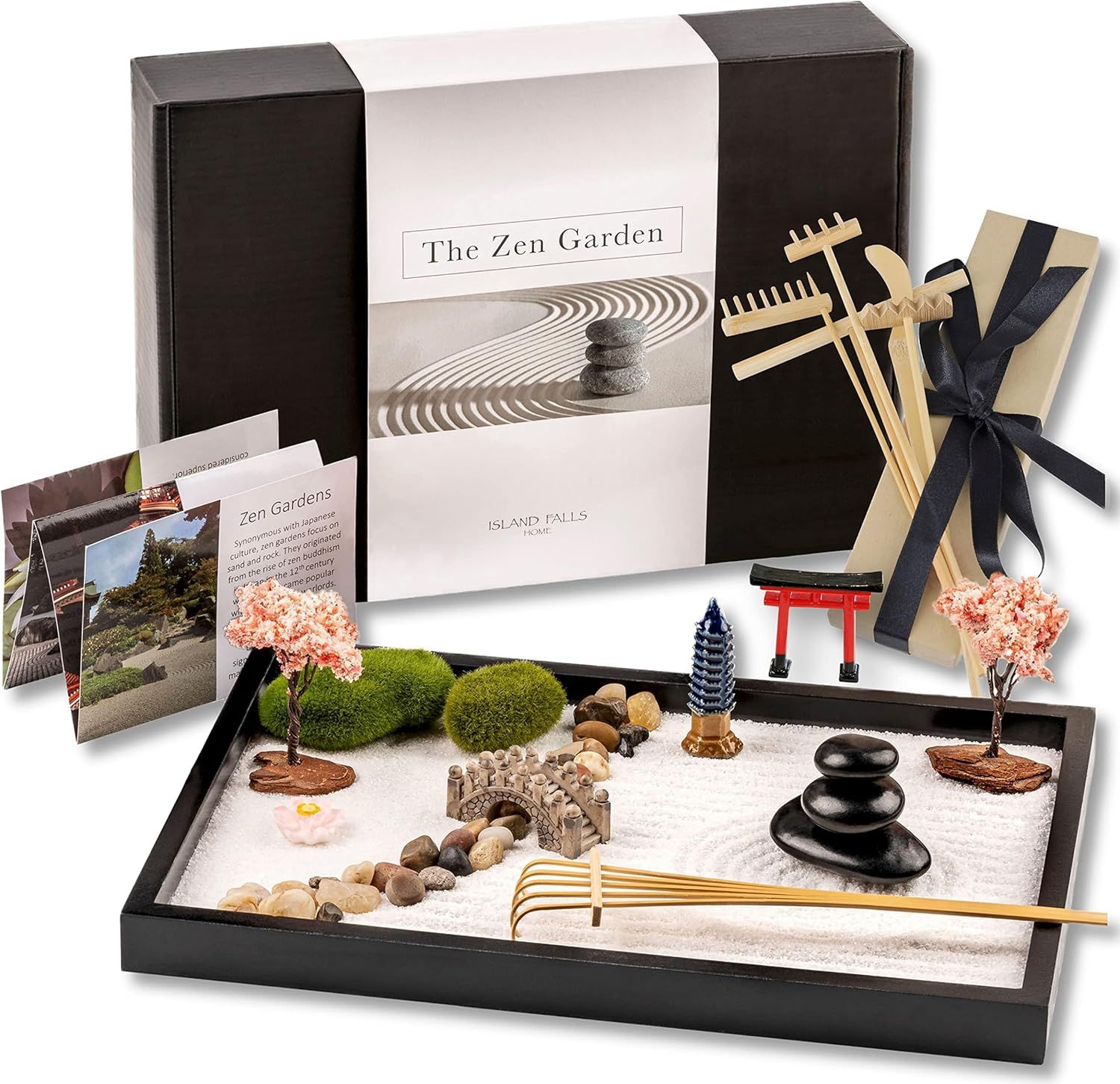 Displays the complete Zen garden kit with all included components—sand tray, miniature accessories, rakes, and decorative elements—to show shoppers exactly what they will receive and how the product…