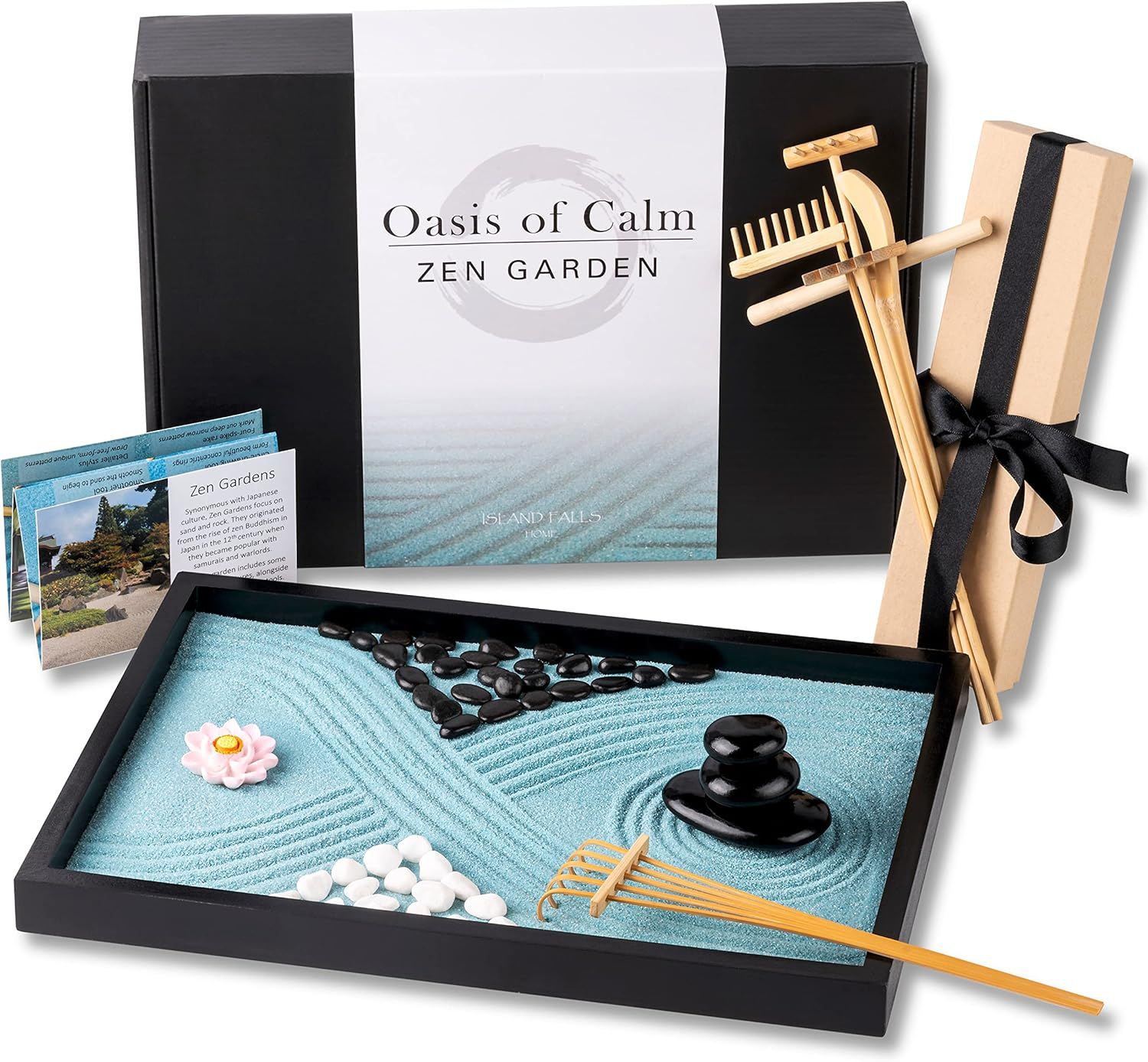 Displays the complete zen garden set with all included components—sand tray, stones, rake, wooden accessories, and decorative elements—to show shoppers exactly what they will receive and communicate…