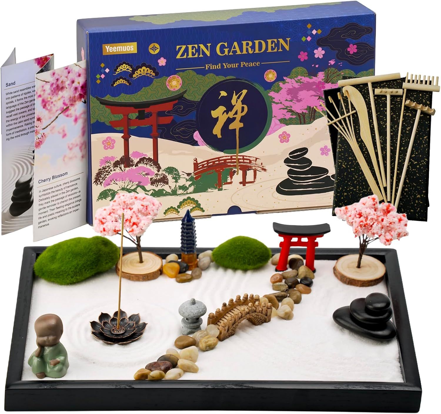 Shows the complete Zen Garden kit with all included components - miniature trees, stones, rake, sand tray, torii gate, pagoda, and decorative elements - to communicate the full value and contents of…