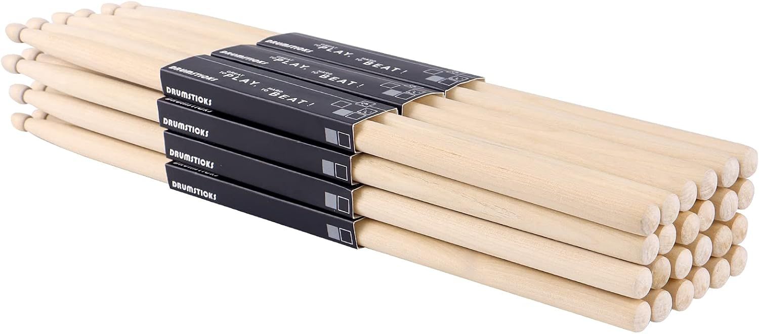 Displays the core product—multiple pairs of wooden drumsticks bundled together—to show the quantity and quality of the set being sold. Shows the branded black sleeve packaging on each pair of…
