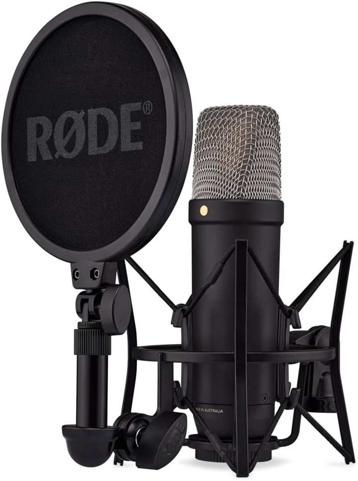 Displays the complete microphone setup with all included mounting accessories to show shoppers exactly what they will receive and how the professional recording system looks assembled. Shows the…