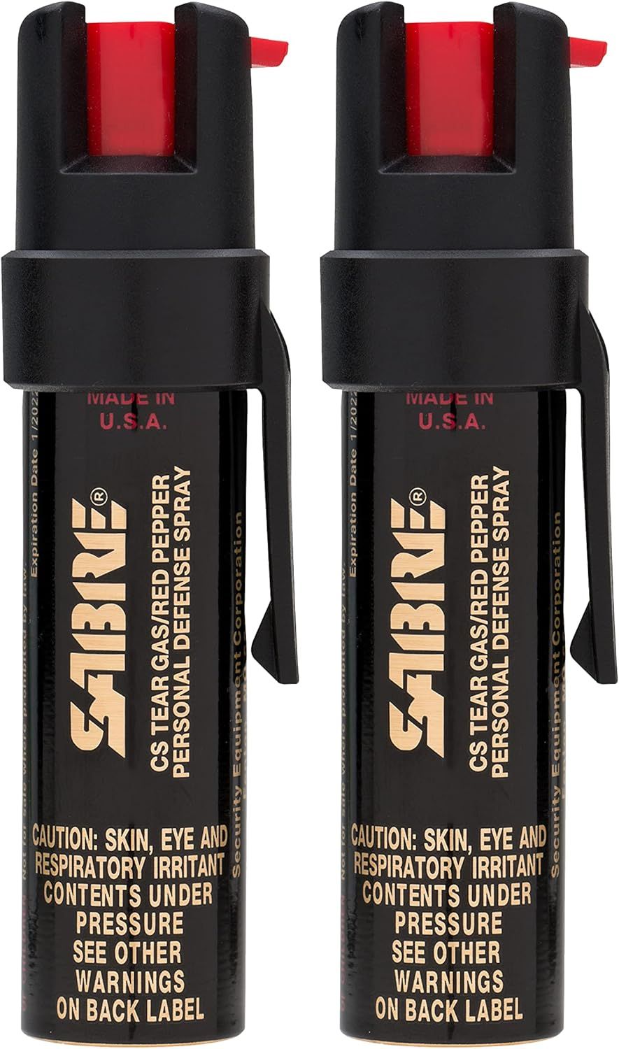 Shows two units of the SABRE pepper spray product clearly on a white background, communicating that this is a multi-pack purchase and displaying the product's branding and key features.