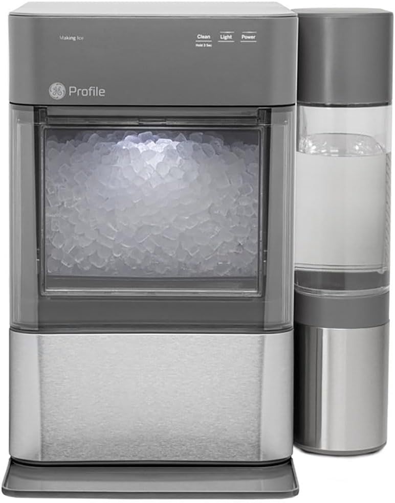 Demonstrates the product actively performing its core function by showing ice in the dispenser compartment and water in the accompanying bottle, communicating that this appliance makes ice and…