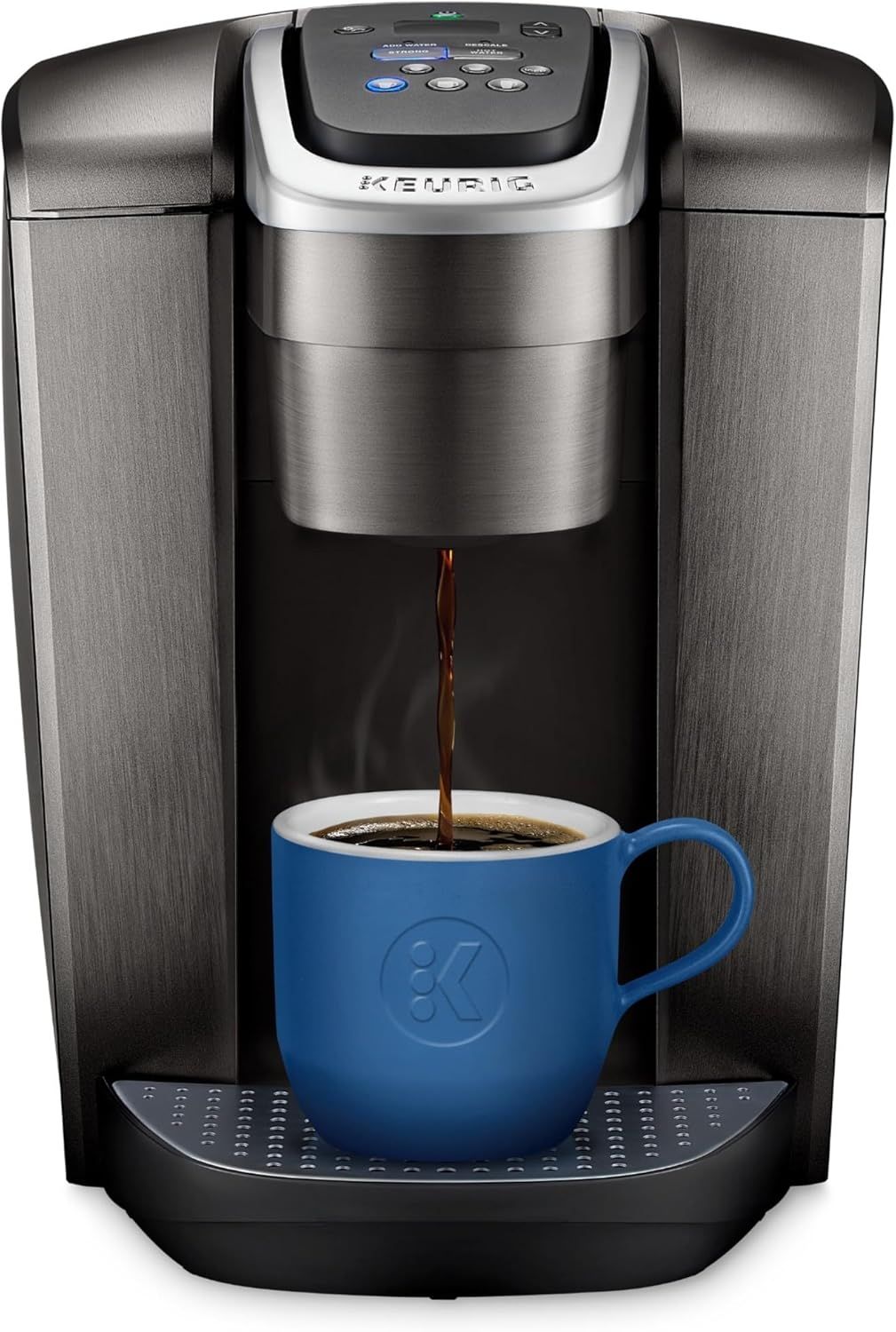 Shows the coffee maker actively dispensing coffee into a mug to demonstrate how the product works and what it does, reassuring shoppers about its brewing capability and ease of use. Displays the…