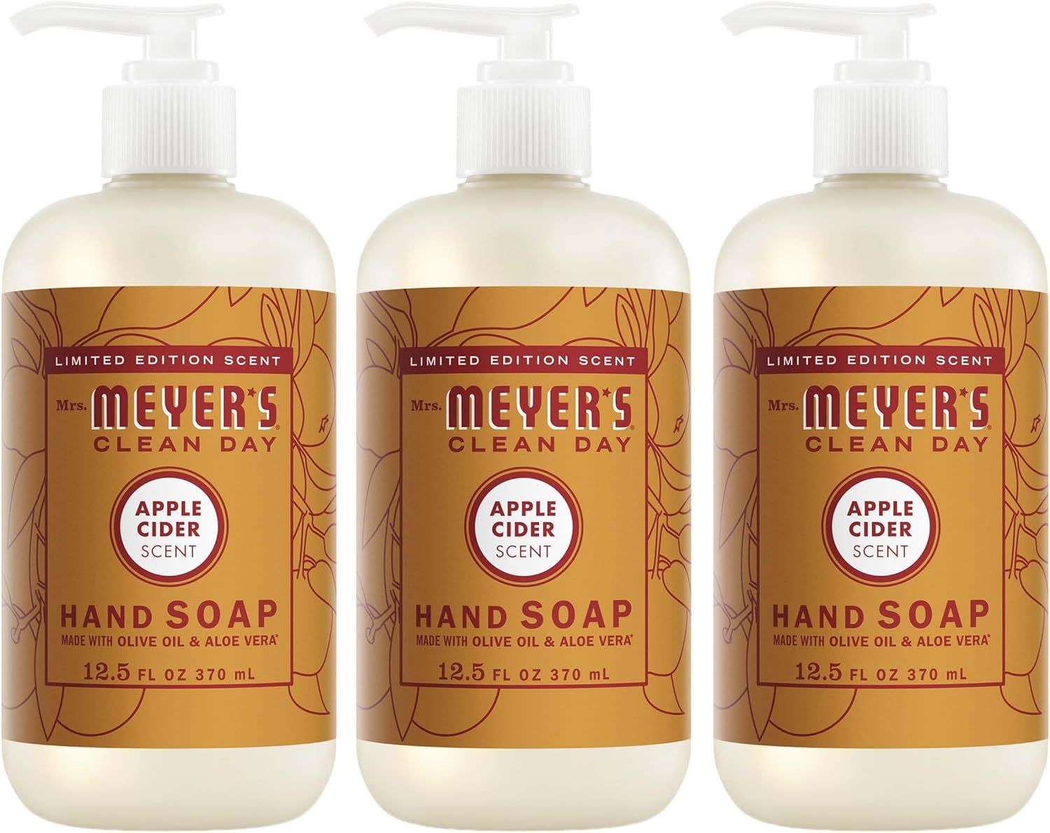 Shows three identical bottles of Mrs. Meyer's Apple Cider hand soap to communicate that this is a multi-pack purchase, emphasizing the limited edition seasonal scent and value of buying multiple…