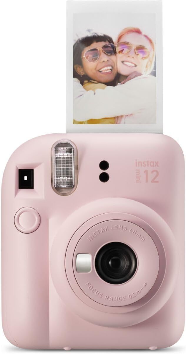 Shows the core product, an Instax Mini 12 instant camera in pink, with a printed photo to demonstrate its instant photo printing capability and appeal to shoppers looking for a fun, nostalgic…