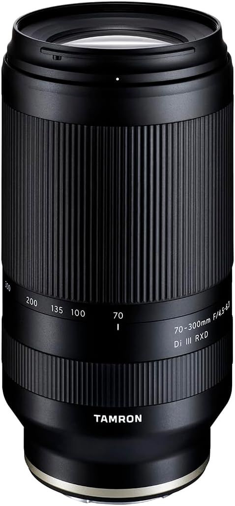 Shows the core product, a Tamron 70-300mm camera lens, in a clean catalog-style presentation to communicate its physical appearance and specifications.