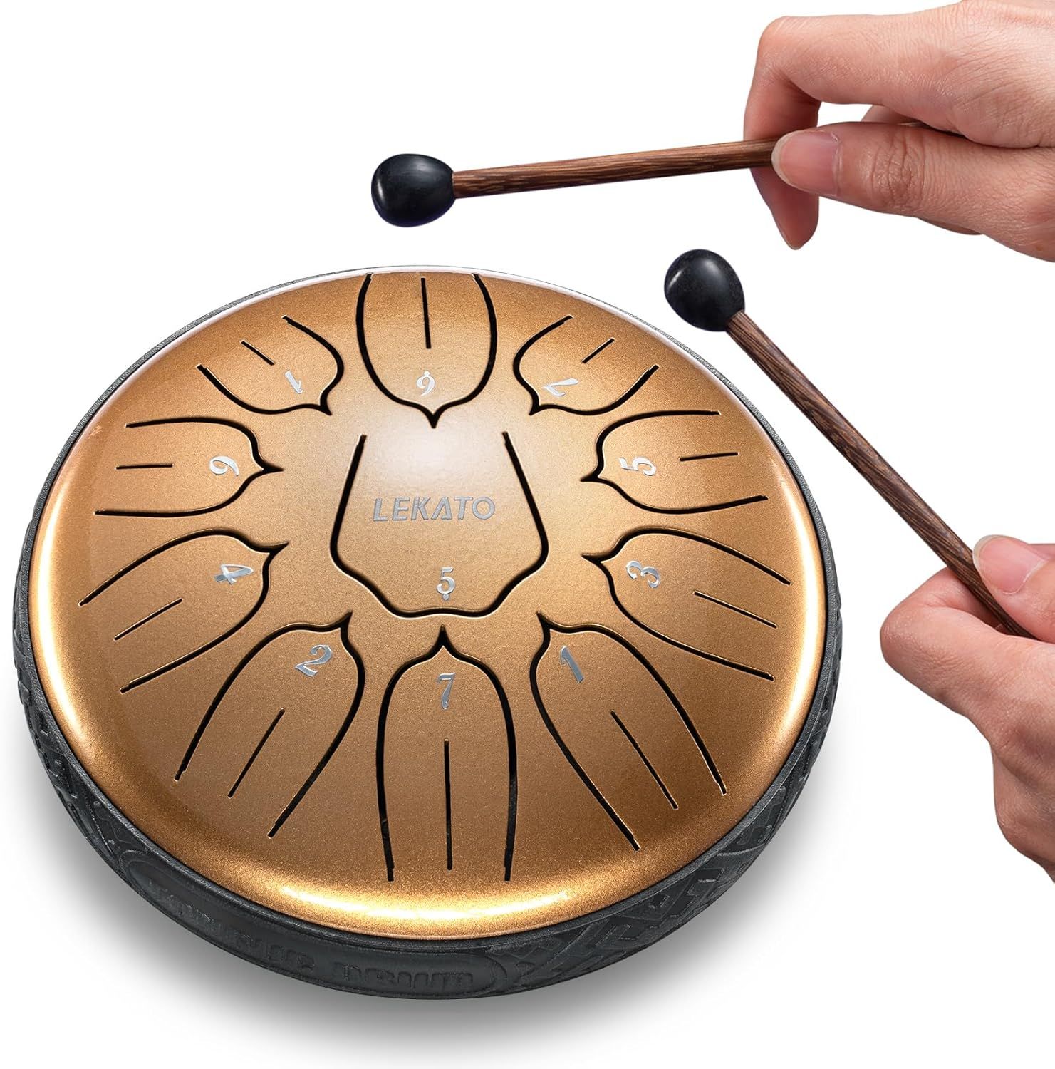 Shows how to hold and play the steel tongue drum with the included mallets, helping shoppers understand proper use and technique. Demonstrates the product actively being played to show how it…