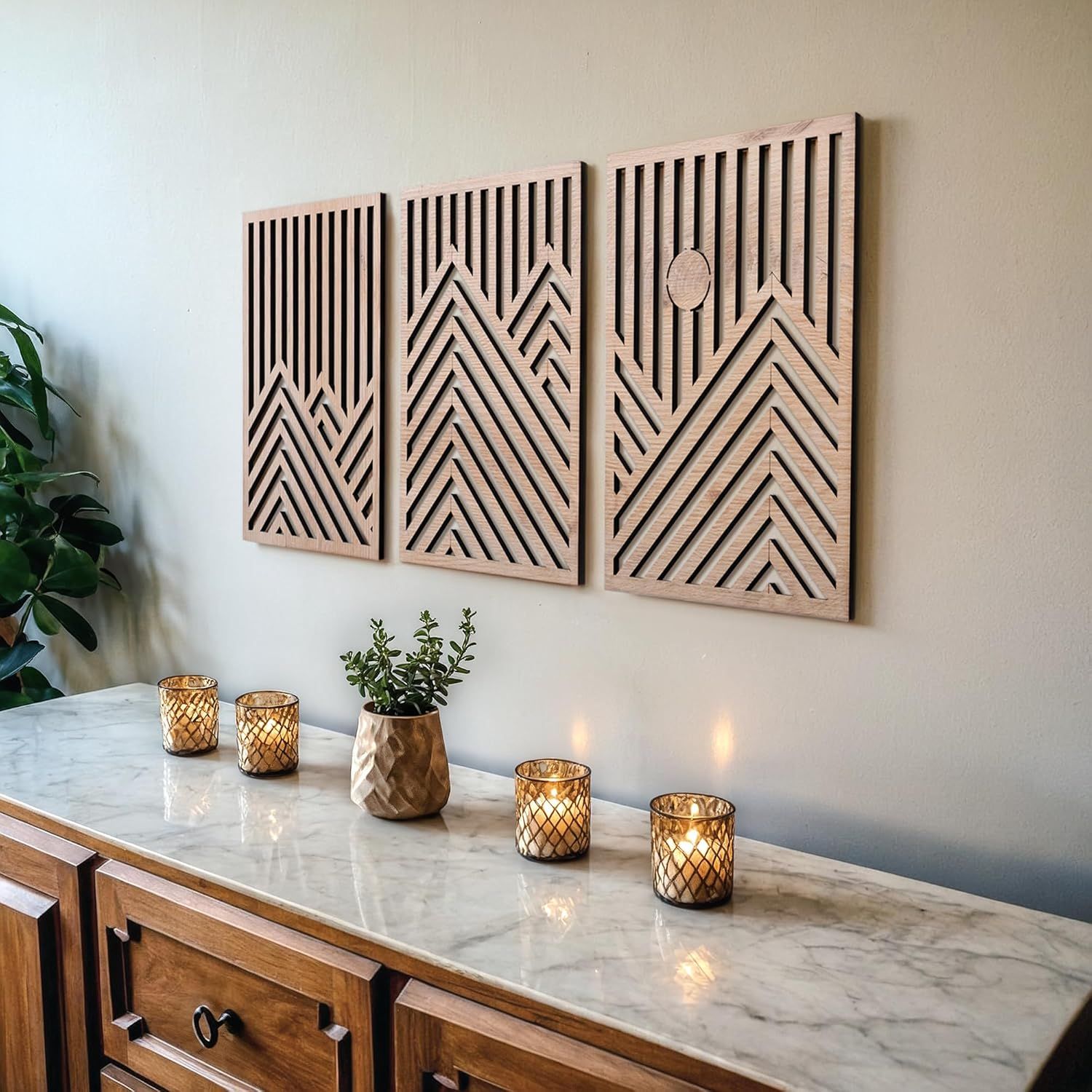 Shows the wooden wall art panels in a styled home environment to help shoppers visualize how the product will look in their own living space and demonstrate its decorative appeal.