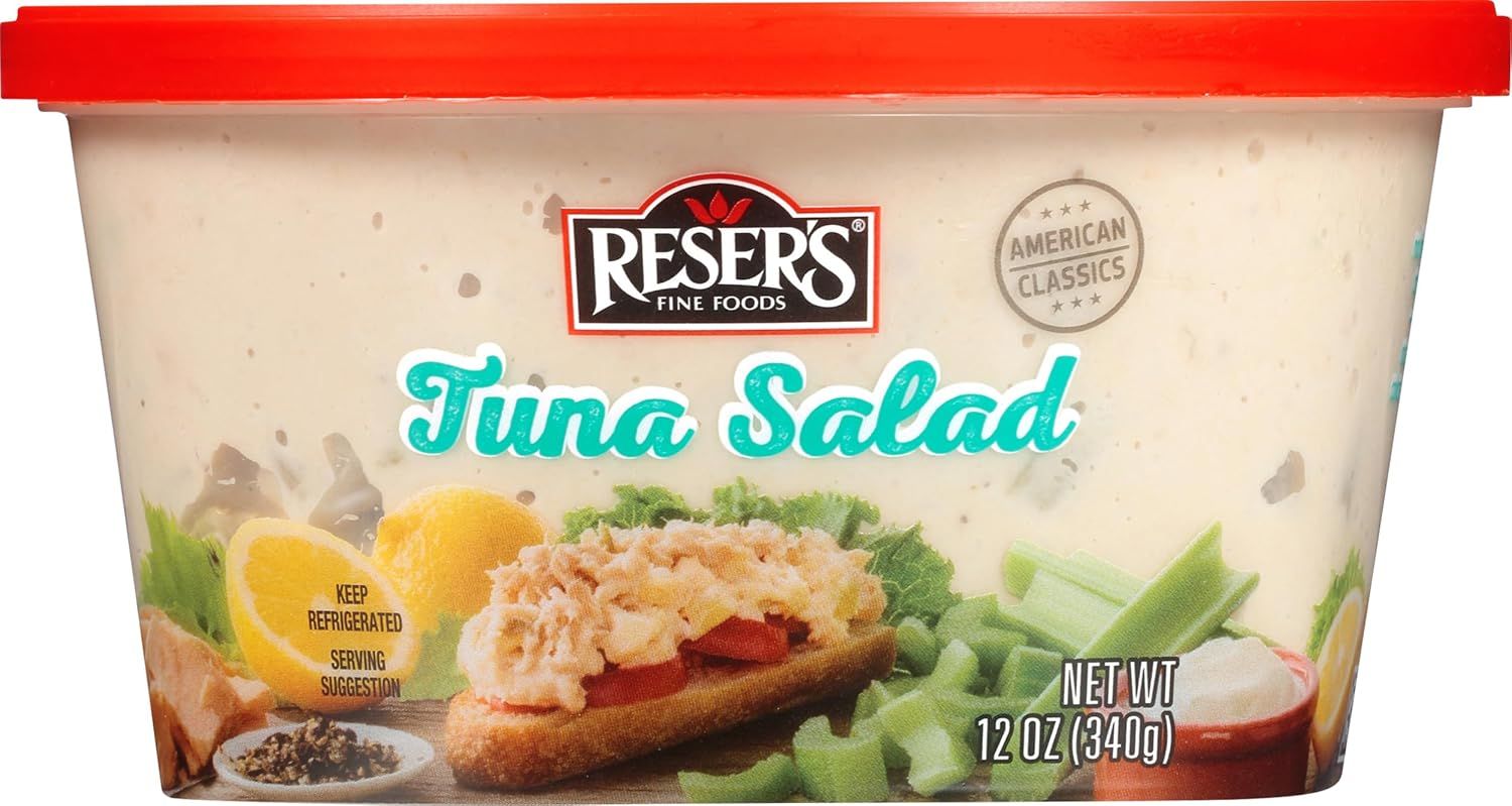 Shows the actual retail packaging the shopper will receive, including the branded container with red lid, helping them recognize the product on shelf and understand the format. Uses appetizing food…