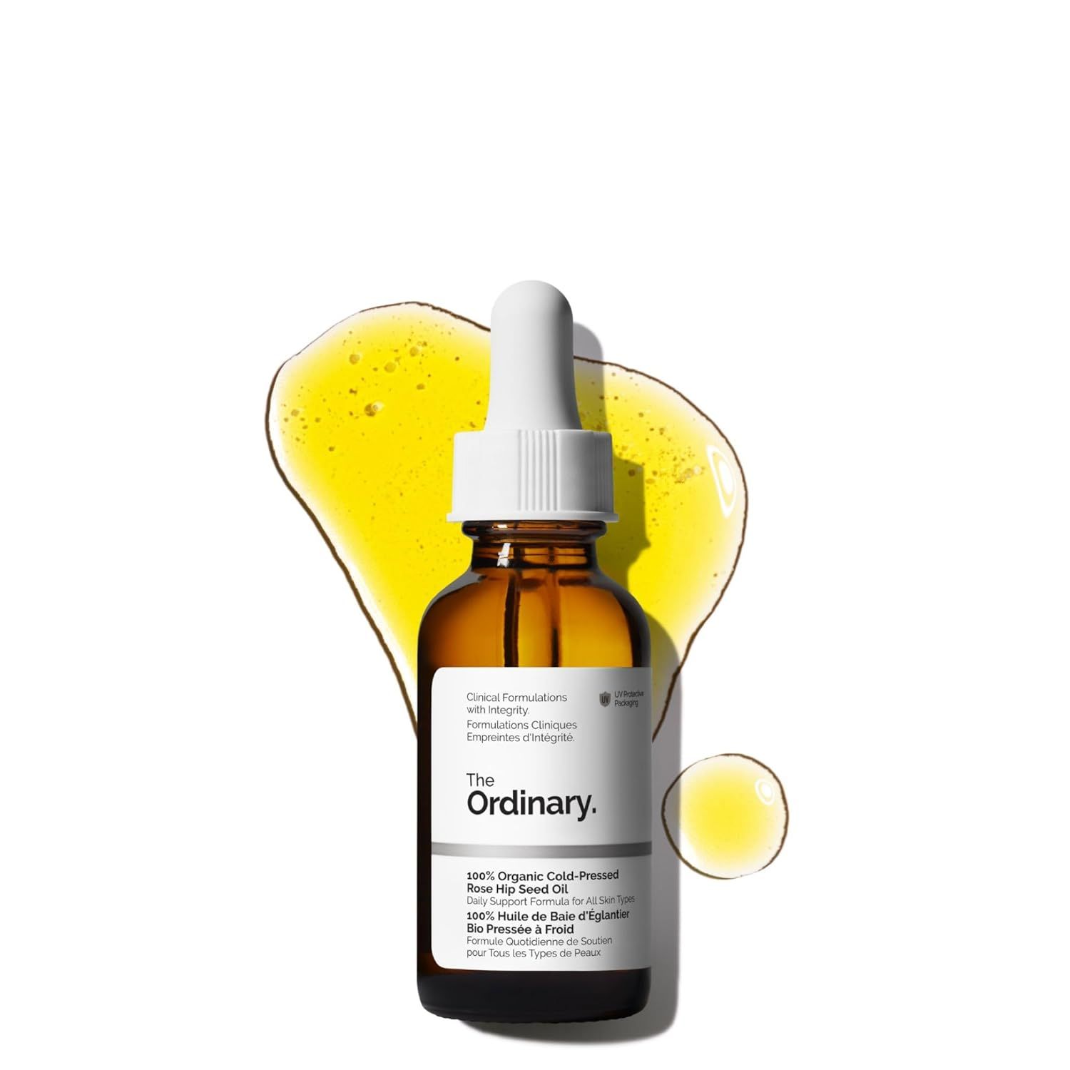 Displays The Ordinary rose hip seed oil bottle as the core product, clearly showing the brand, product name, and dropper applicator to help shoppers identify what they are purchasing. Uses artistic…