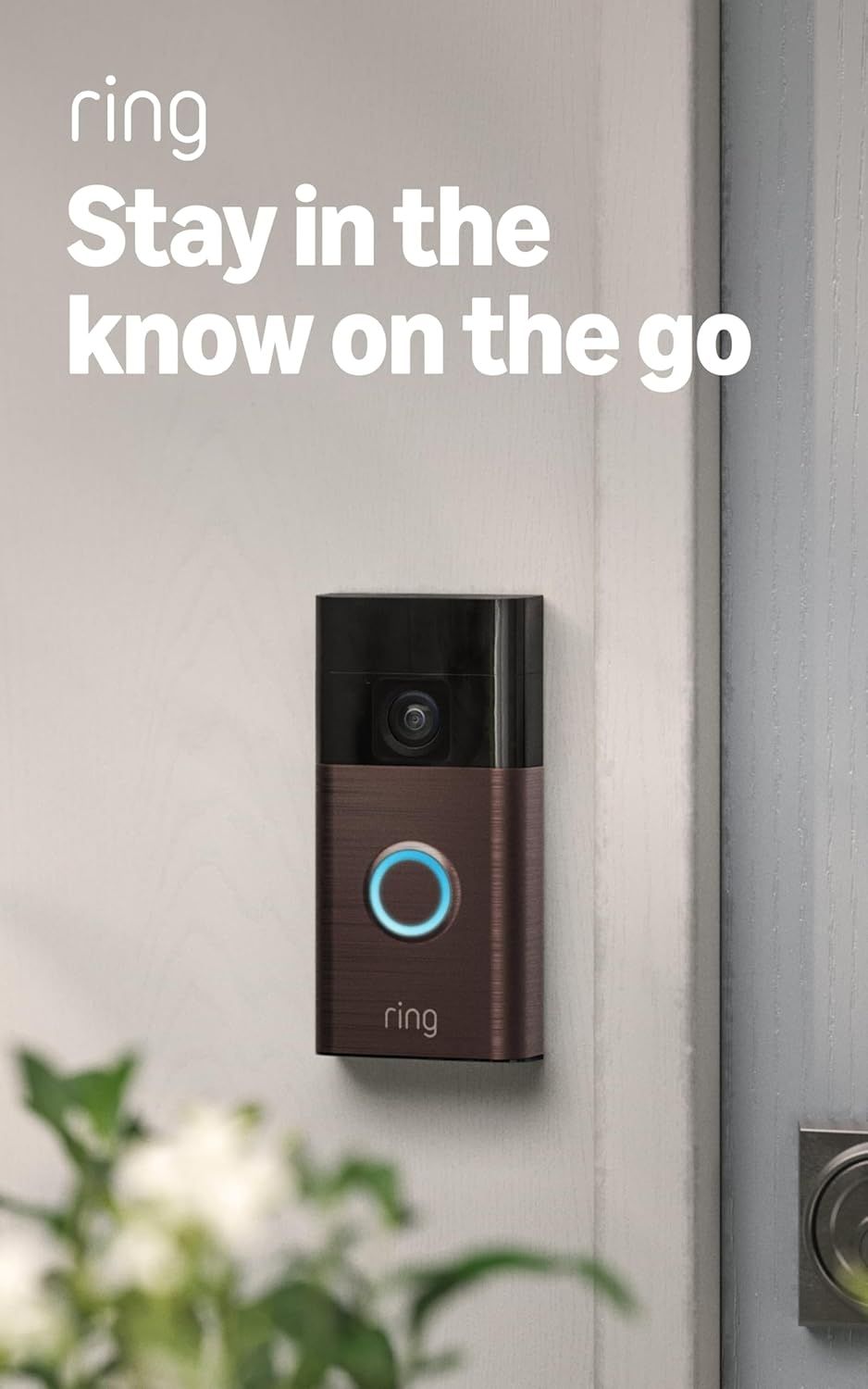 Shows the Ring video doorbell installed in a real-world setting to demonstrate its design and reassure shoppers about its appearance and functionality for home security monitoring on the go.…