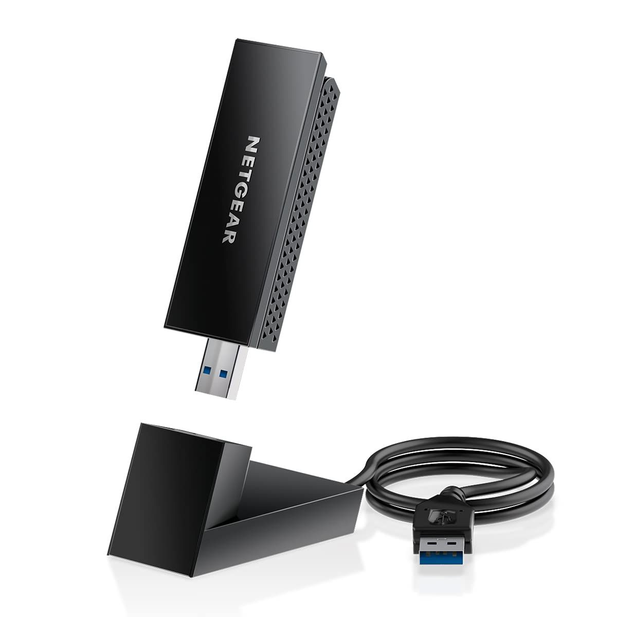 Shows the core NETGEAR USB adapter product along with its included stand and USB cable, giving shoppers a clear view of what they will receive. Demonstrates that the product comes with additional…