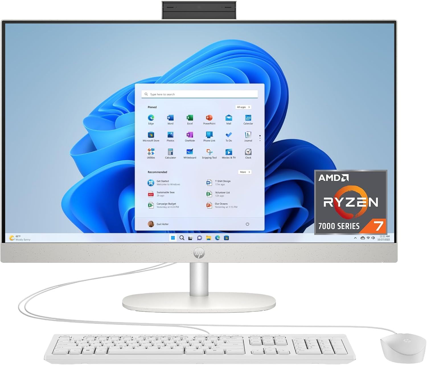 Shows the complete desktop computer system including monitor, keyboard, and mouse to communicate the full product offering and its clean, modern design. Demonstrates the computer in active use with…