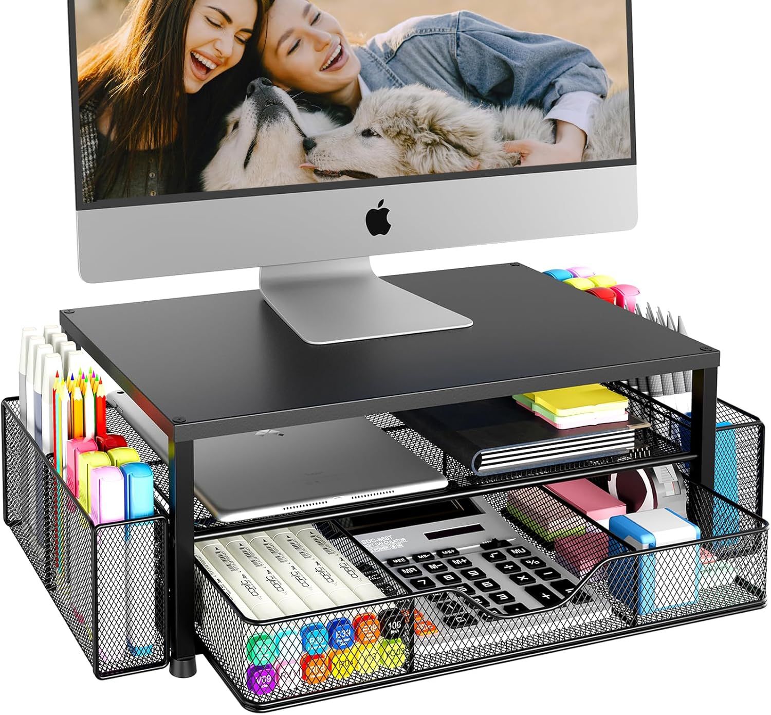 Shows the core product, a black metal monitor stand with integrated storage compartments and mesh organizers, demonstrating its ability to elevate a monitor while providing organized storage for…