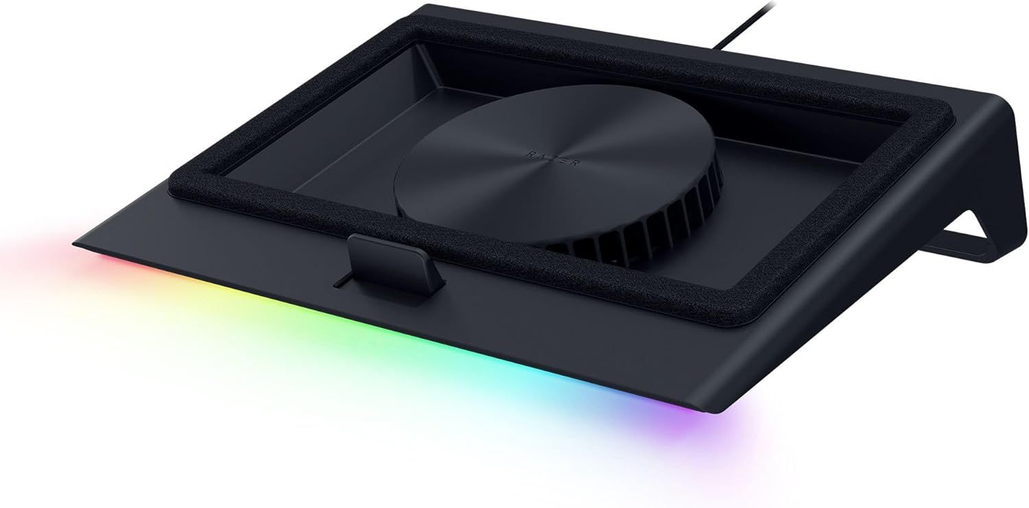 Displays the laptop cooling stand as the core product, showcasing its design with integrated fan and RGB lighting to communicate its cooling functionality and aesthetic appeal. Uses a clean white…