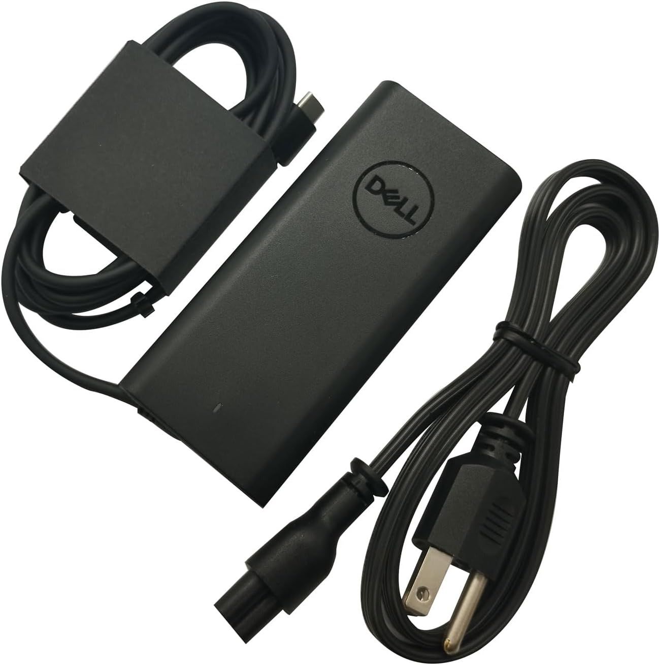 Shows the complete Dell power adapter unit with both the power brick and included cables, allowing shoppers to see exactly what they will receive and verify compatibility with their device.…
