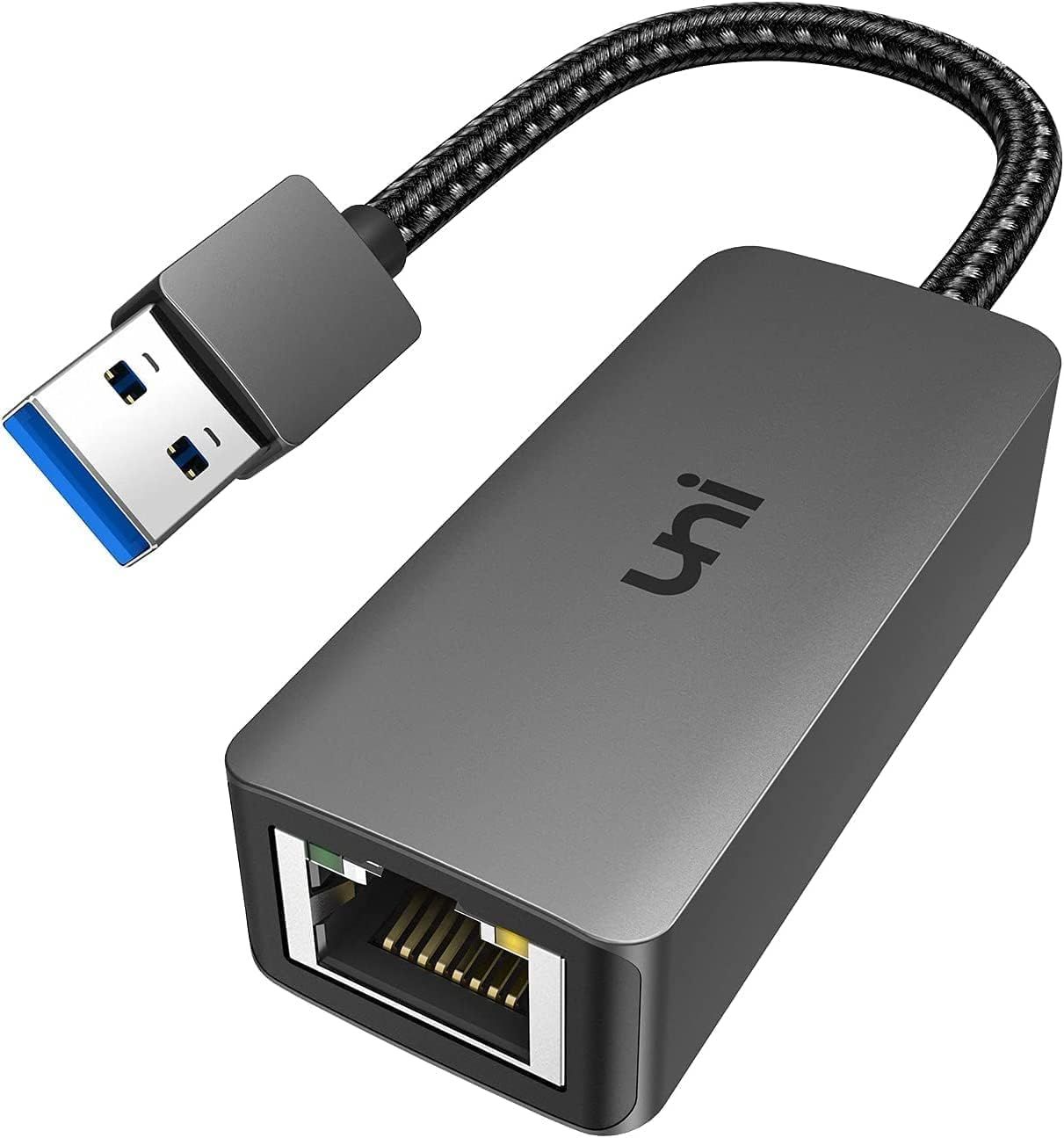 Shows the core product clearly - a USB to Ethernet adapter with braided cable - allowing shoppers to understand exactly what they are purchasing. Uses a subtle drop shadow beneath the product to…