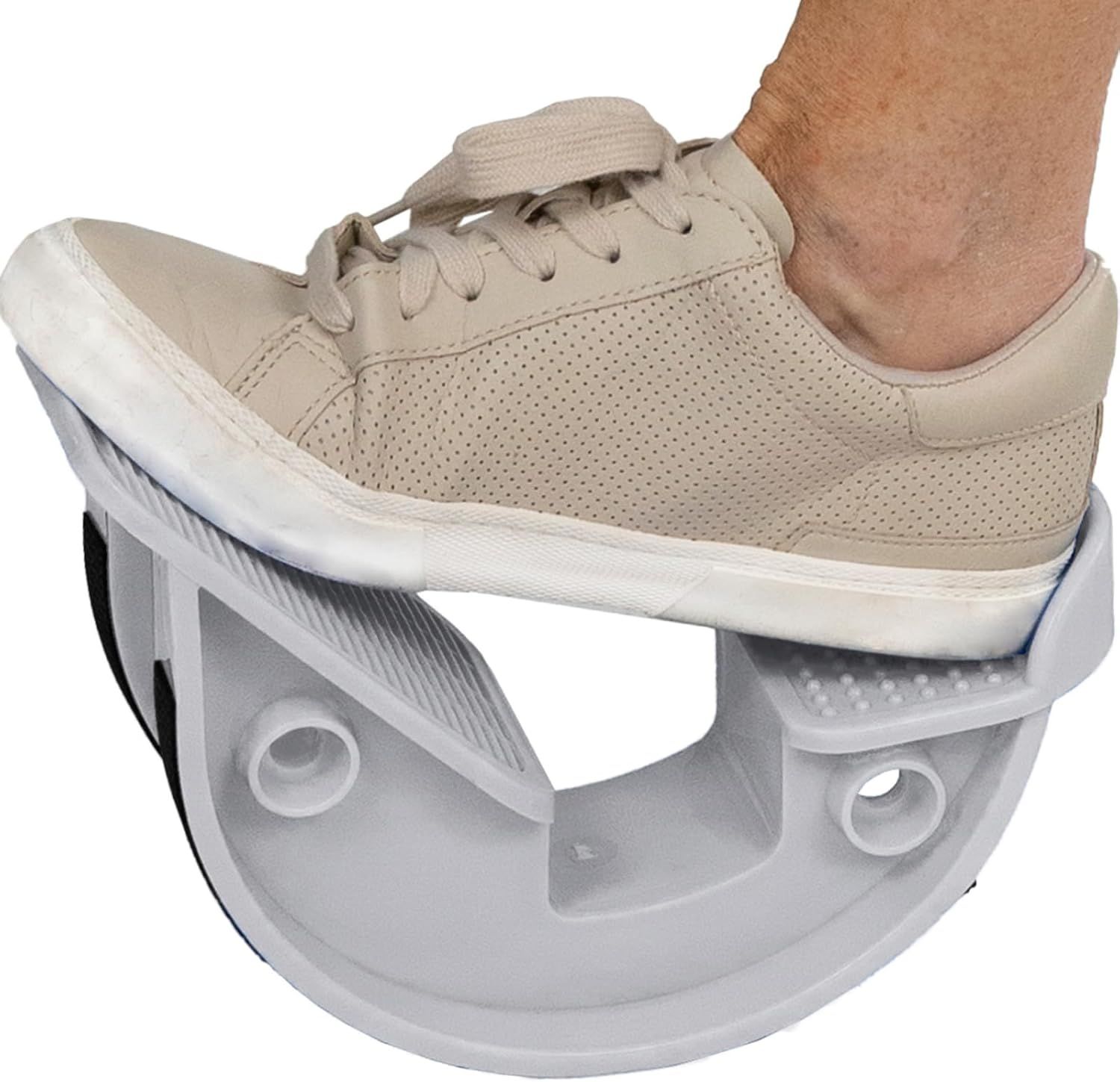 Shows a person wearing the product to demonstrate how it fits on the foot and provides scale context for the ankle support device. Demonstrates how the ankle support device functions when worn,…
