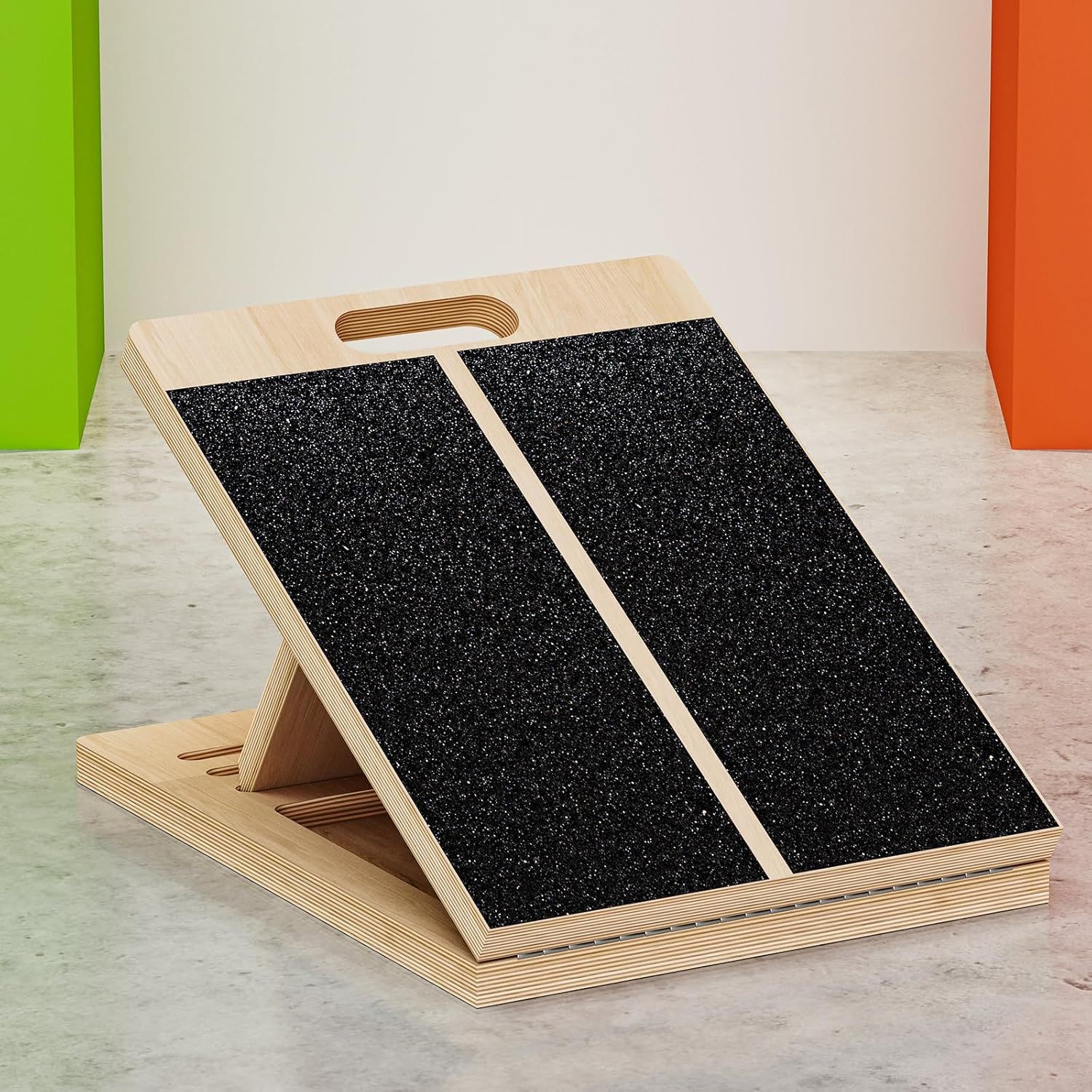 Shows the core product—an adjustable incline board with non-slip textured surfaces and a built-in handle—to communicate its design, portability, and functionality for stretching or exercise.…