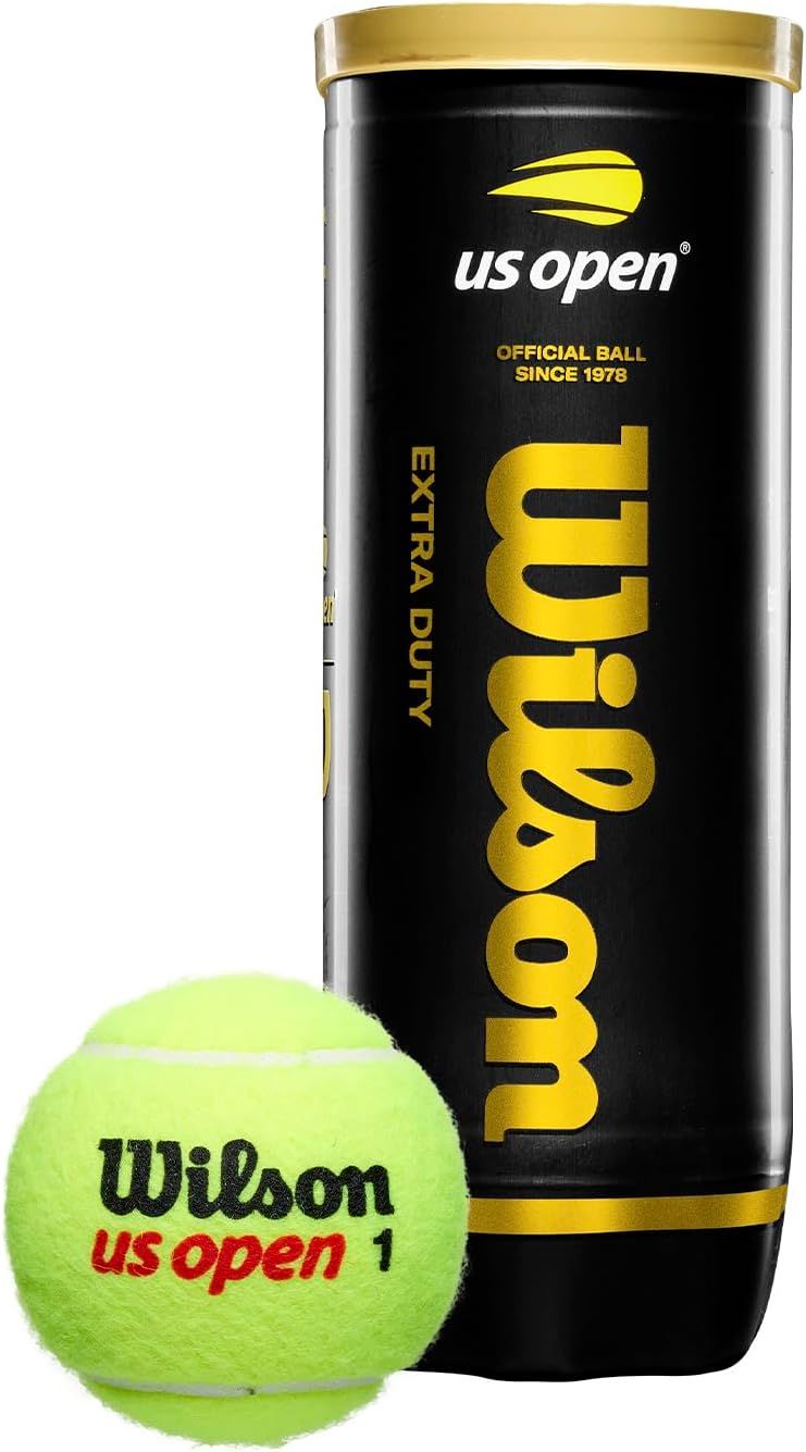 Shows the core product - Wilson US Open Extra Duty tennis balls in their retail canister with one ball displayed to communicate the official tournament-grade quality and brand authenticity. Displays…