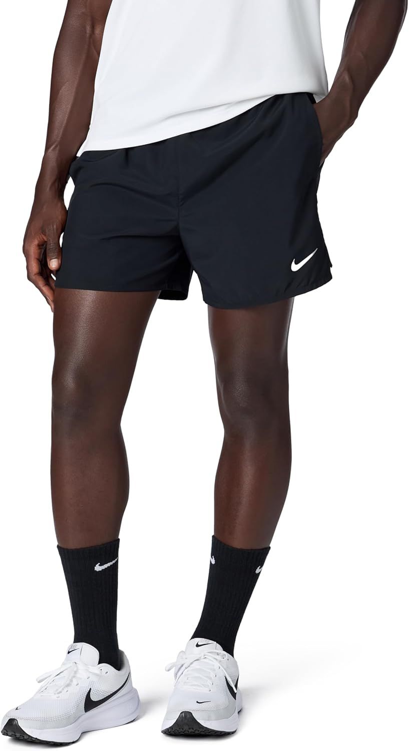 Shows a person wearing the athletic shorts to demonstrate fit, length, and how the product looks when worn, helping shoppers visualize the product on themselves.