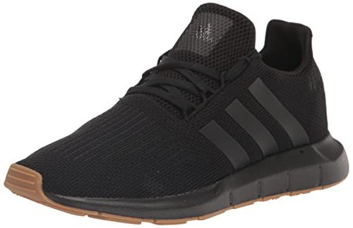 Displays the core sellable product—a black athletic sneaker—in a clear, catalog-style format on a white background to show the shopper exactly what they are purchasing. Uses a subtle drop shadow…